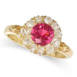 AN ANTIQUE PINK SPINEL AND DIAMOND CLUSTER RING in 18ct yellow gold, set with a round cut spinel ...