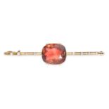 AN ANTIQUE PINK TOURMALINE AND PEARL BAR BROOCH in 15ct yellow gold, set with a cushion cut pink ...