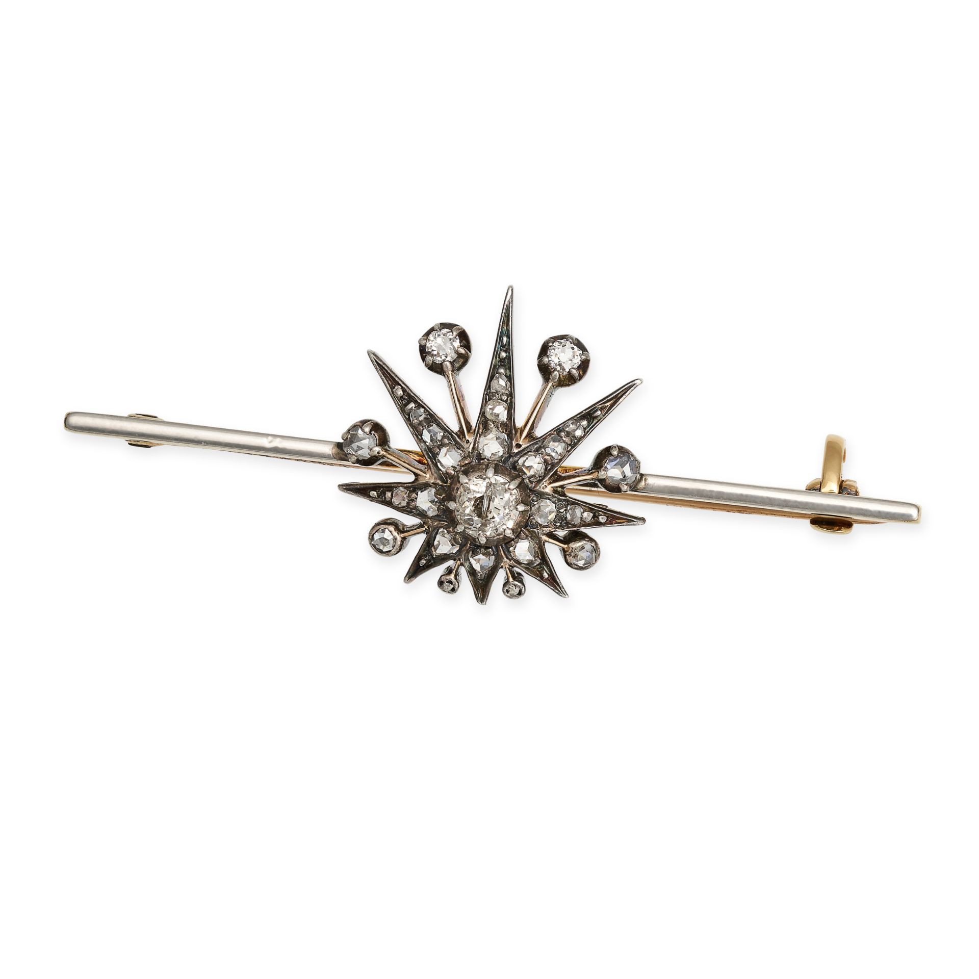 AN ANTIQUE VICTORIAN DIAMOND STAR BAR BROOCH in yellow gold and silver, designed as an eight raye...