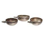 GEORG JENSEN, A SET OF THREE SALT CELLARS in sterling silver, design number 402, foliate handles,...