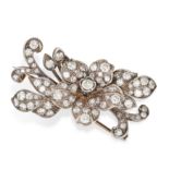 AN ANTIQUE VICTORIAN DIAMOND FLOWER BROOCH in yellow gold and silver, set throughout with old cut...