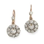 A PAIR OF ANTIQUE DIAMOND CLUSTER EARRINGS in yellow gold, each comprising a cluster of old cut d...