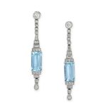 A PAIR OF AQUAMARINE AND DIAMOND DROP EARRINGS in platinum and yellow gold, each set with a row o...