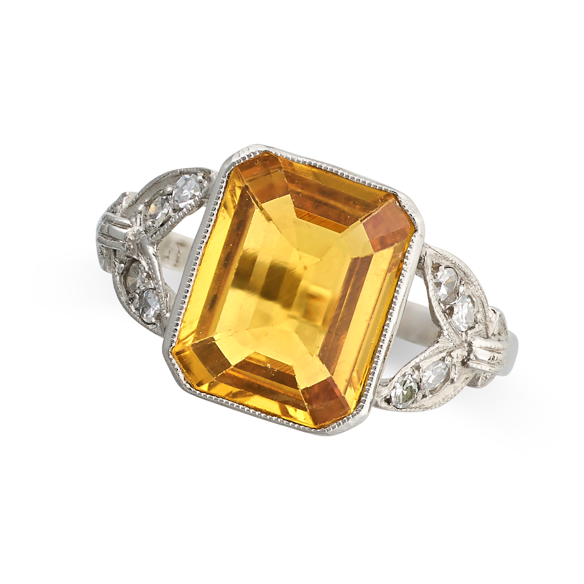 A YELLOW SAPPHIRE AND DIAMOND RING in platinum, set with an octagonal step cut yellow sapphire of...