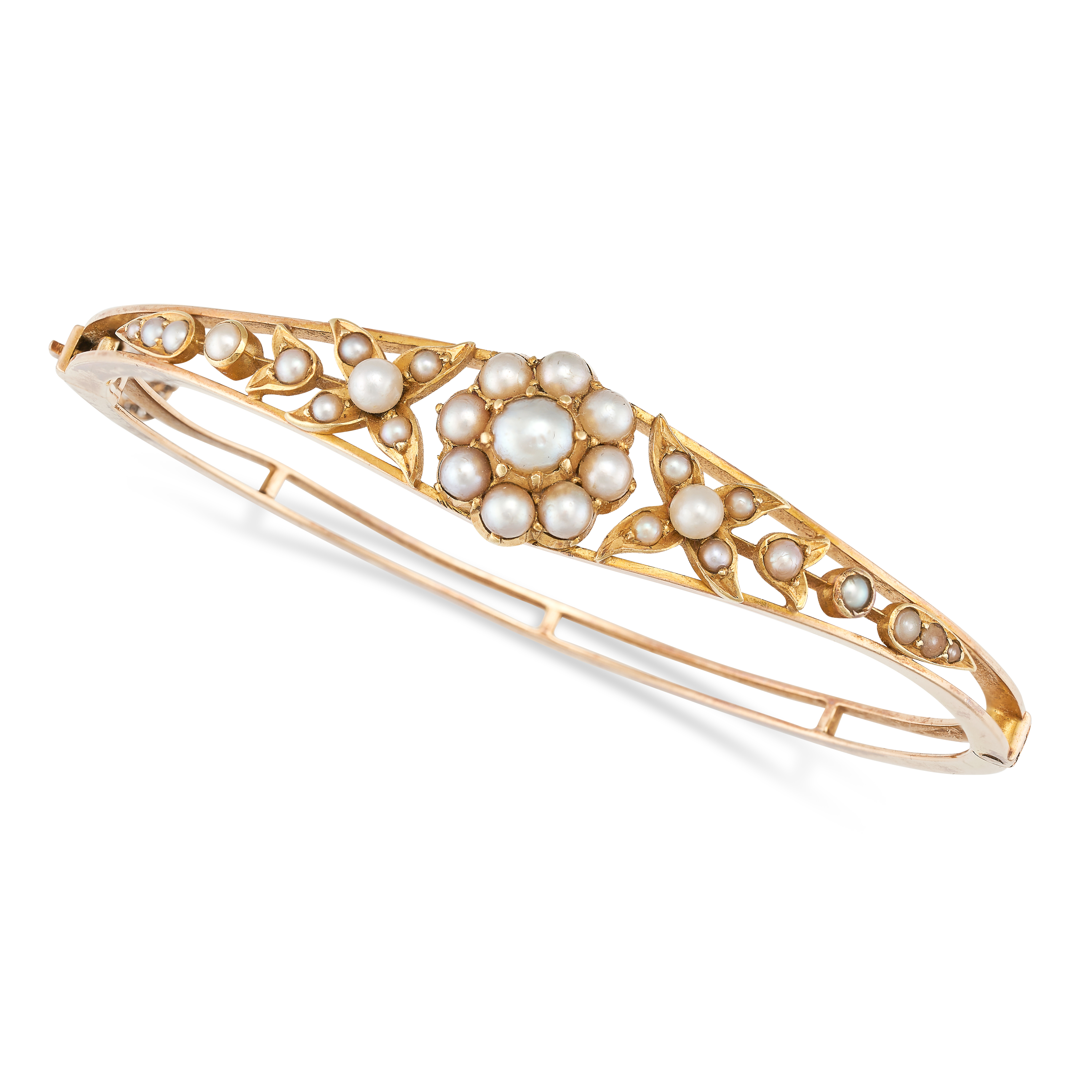 AN ANTIQUE PEARL BANGLE, LATE 19TH CENTURY in yellow gold, set with a cluster of pearls in the fo...