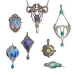 AN ASSORTED LOT OF ANTIQUE ARTS AND CRAFTS JEWELLERY in silver, comprising four pendants decorate...