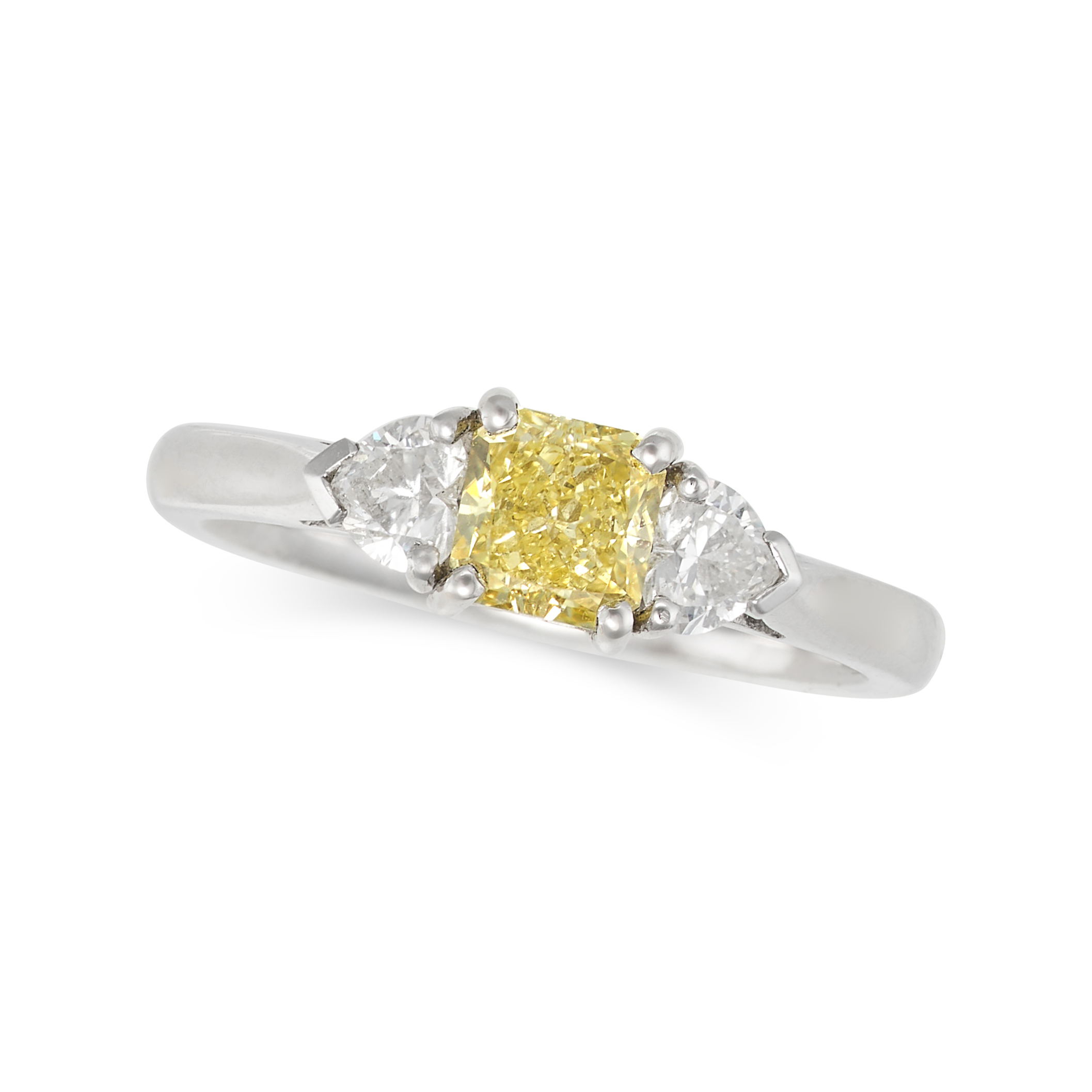 A YELLOW DIAMOND THREE STONE RING in platinum, set with a princess cut yellow diamond of 0.70 car...