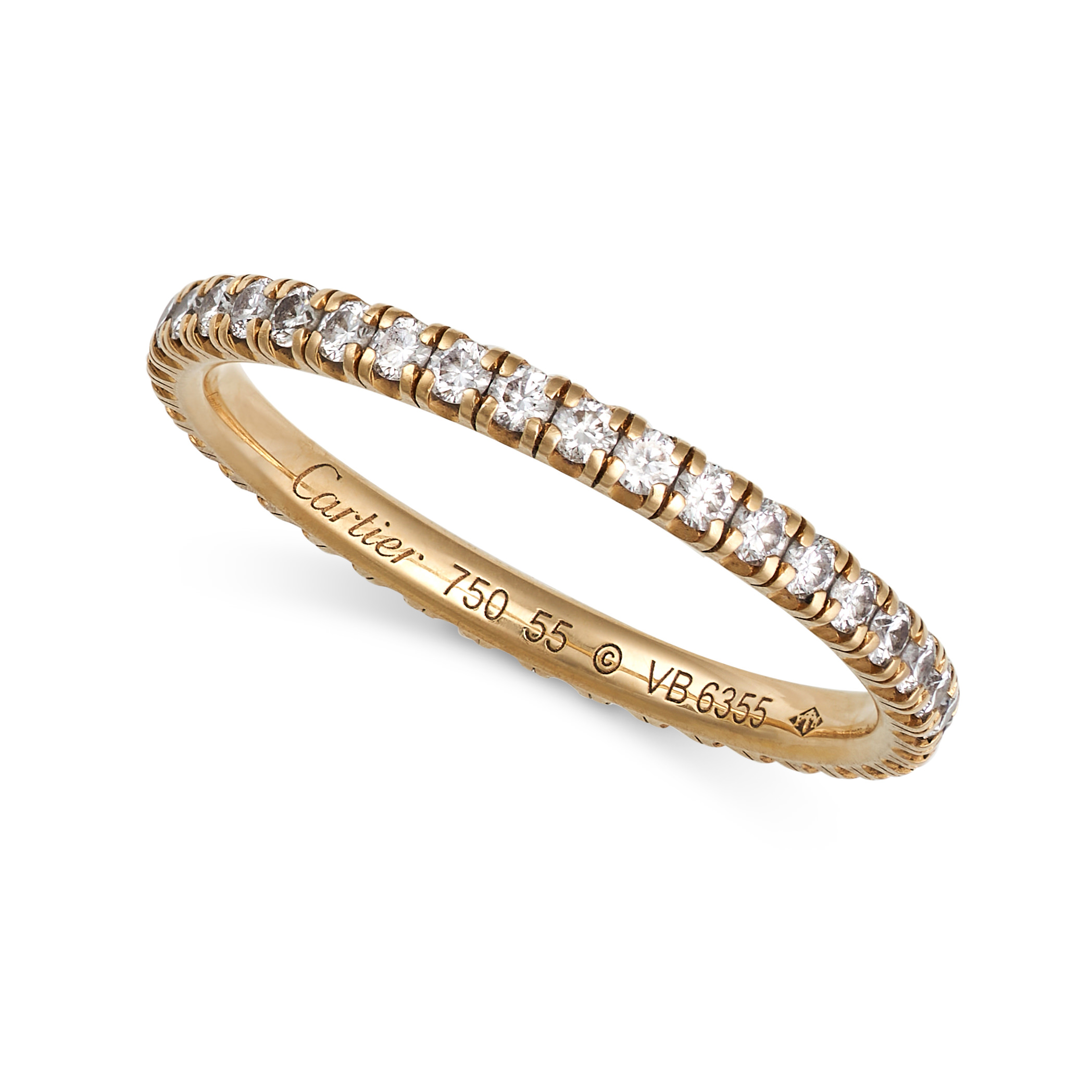 CARTIER, AN ETINCELLE DE CARTIER DIAMOND ETERNITY RING in 18ct yellow gold, set with a row of rou...