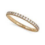 CARTIER, AN ETINCELLE DE CARTIER DIAMOND ETERNITY RING in 18ct yellow gold, set with a row of rou...