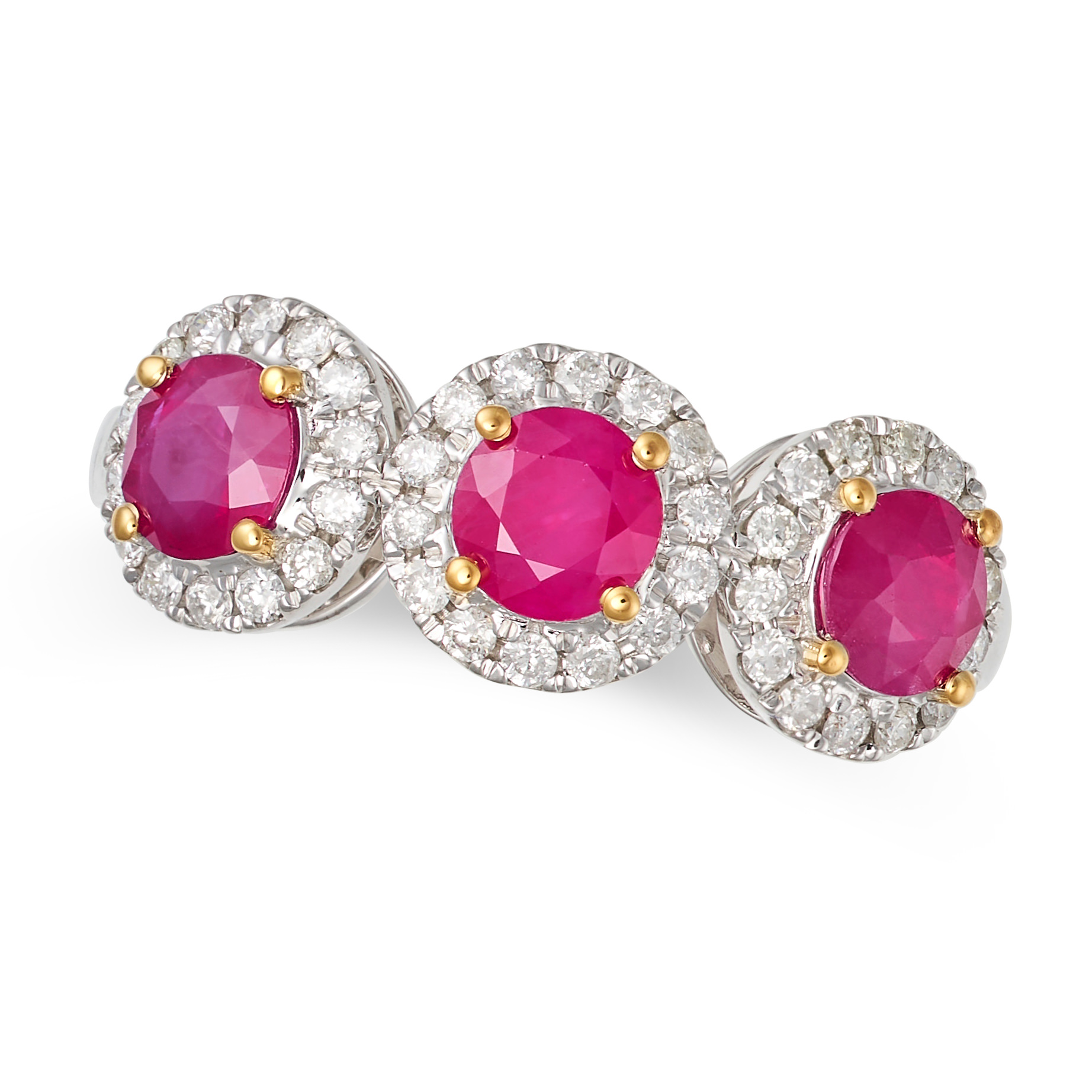 A RUBY AND DIAMOND CLUSTER RING in 18ct white gold, set with three round cut rubies in clusters o...