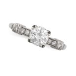 A VINTAGE SOLITAIRE DIAMOND RING in platinum, set with a round brilliant cut diamond of approxima...