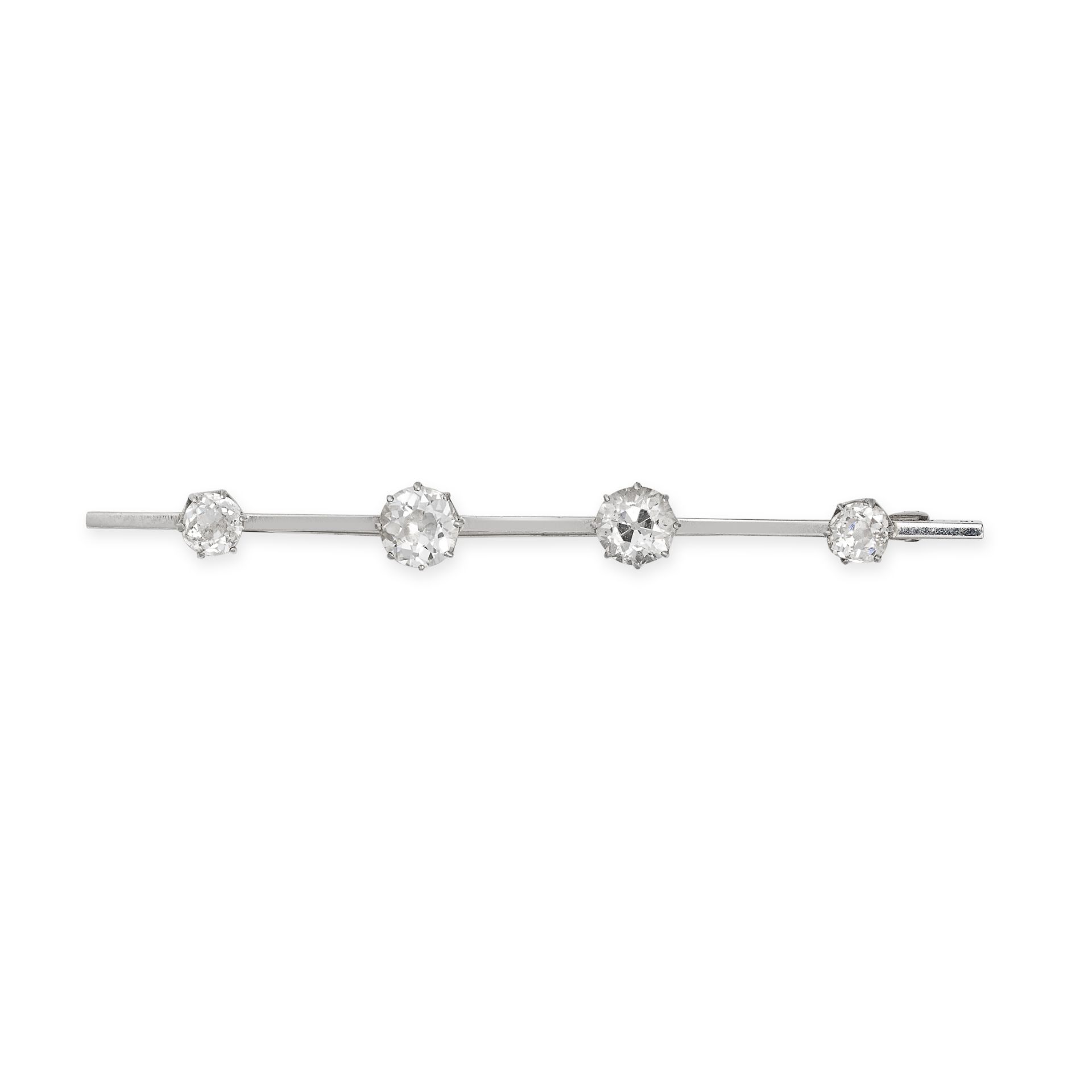 A VINTAGE DIAMOND BAR BROOCH in 18ct white gold and platinum, set with four graduating old mine c...