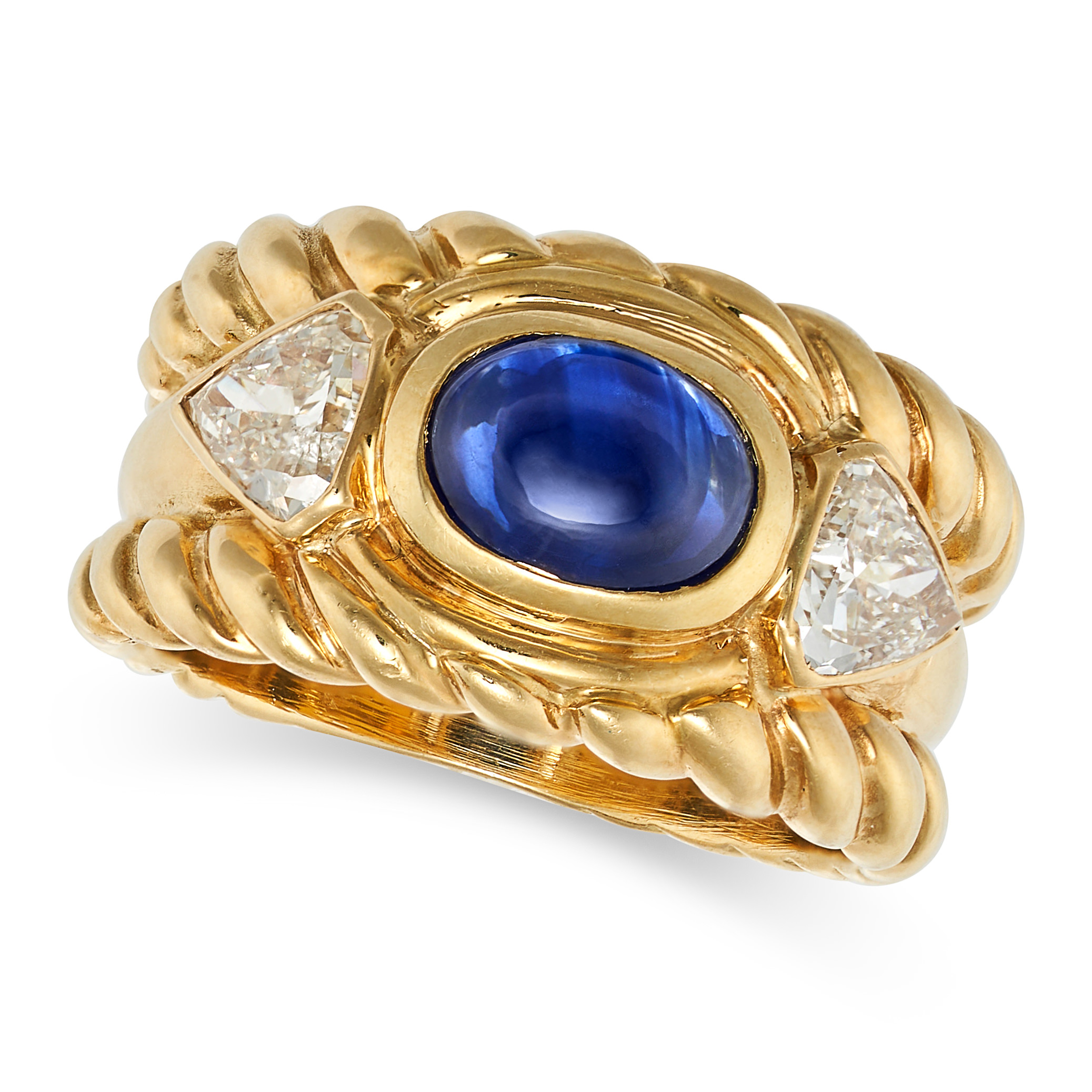 A SAPPHIRE AND DIAMOND DRESS RING in 18ct yellow gold, set with a cabochon sapphire of approximat...