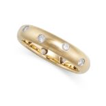 TIFFANY & CO., AN ETOILE DIAMOND BAND RING in 18ct yellow gold and platinum, set with round brill...