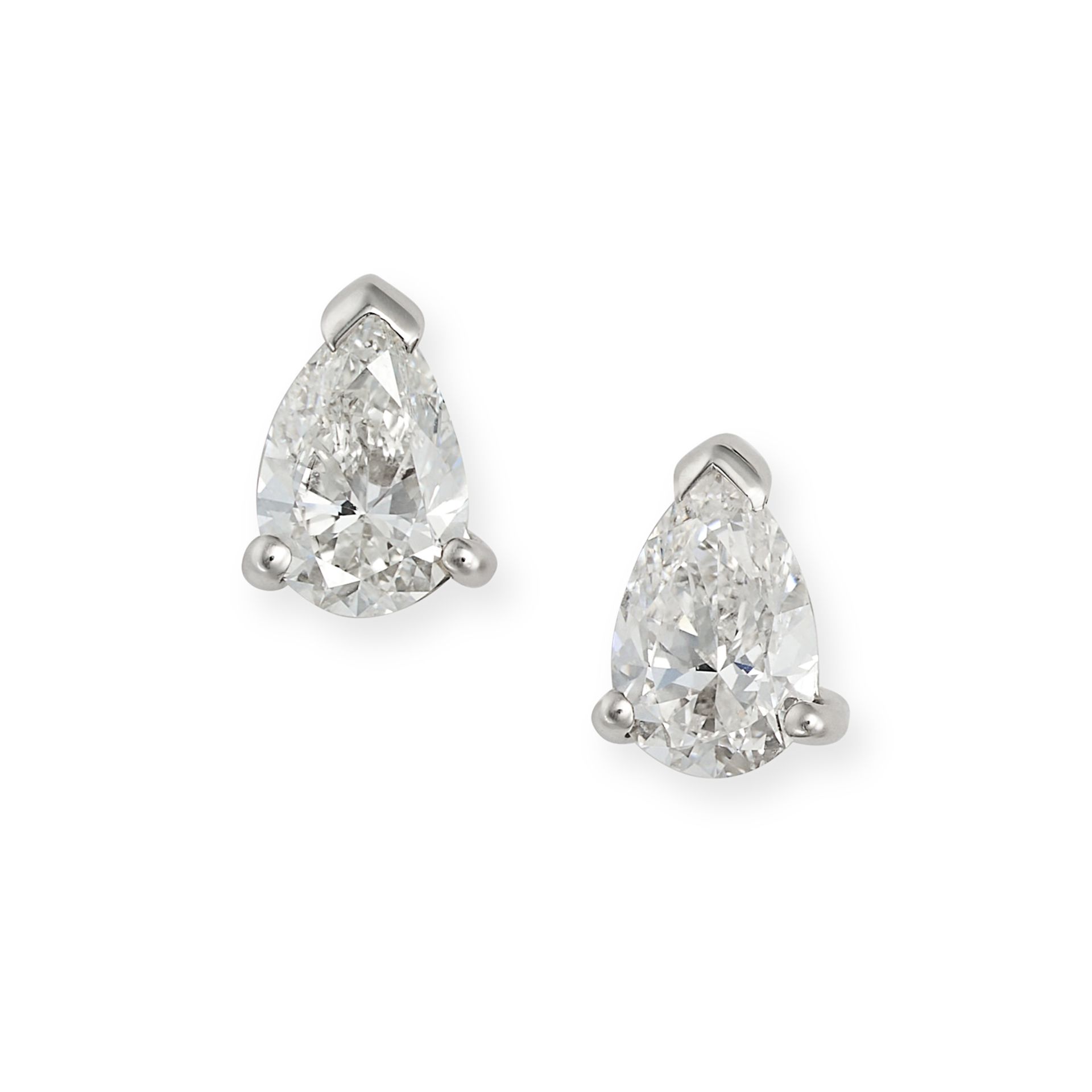 A PAIR OF DIAMOND STUD EARRINGS in 18ct white gold, each set with a pear cut diamond, the diamond...