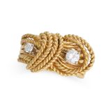 A VINTAGE DIAMOND DRESS RING in yellow and white gold, formed of rope-work design set with two ro...