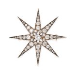 AN ANTIQUE DIAMOND STAR BROOCH in yellow gold and silver, designed as an eight rayed star, set th...