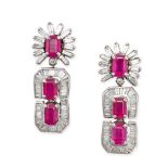 A PAIR OF RUBY AND DIAMOND DROP EARRINGS in 18ct white gold, each set with an octagonal step cut ...