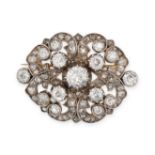 AN ANTIQUE DIAMOND BROOCH in yellow gold, in scrolling form set throughout with old cut and rose ...