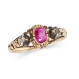 AN ANTIQUE RUBY AND DIAMOND RING in yellow gold and silver, set with an oval cut ruby between two...