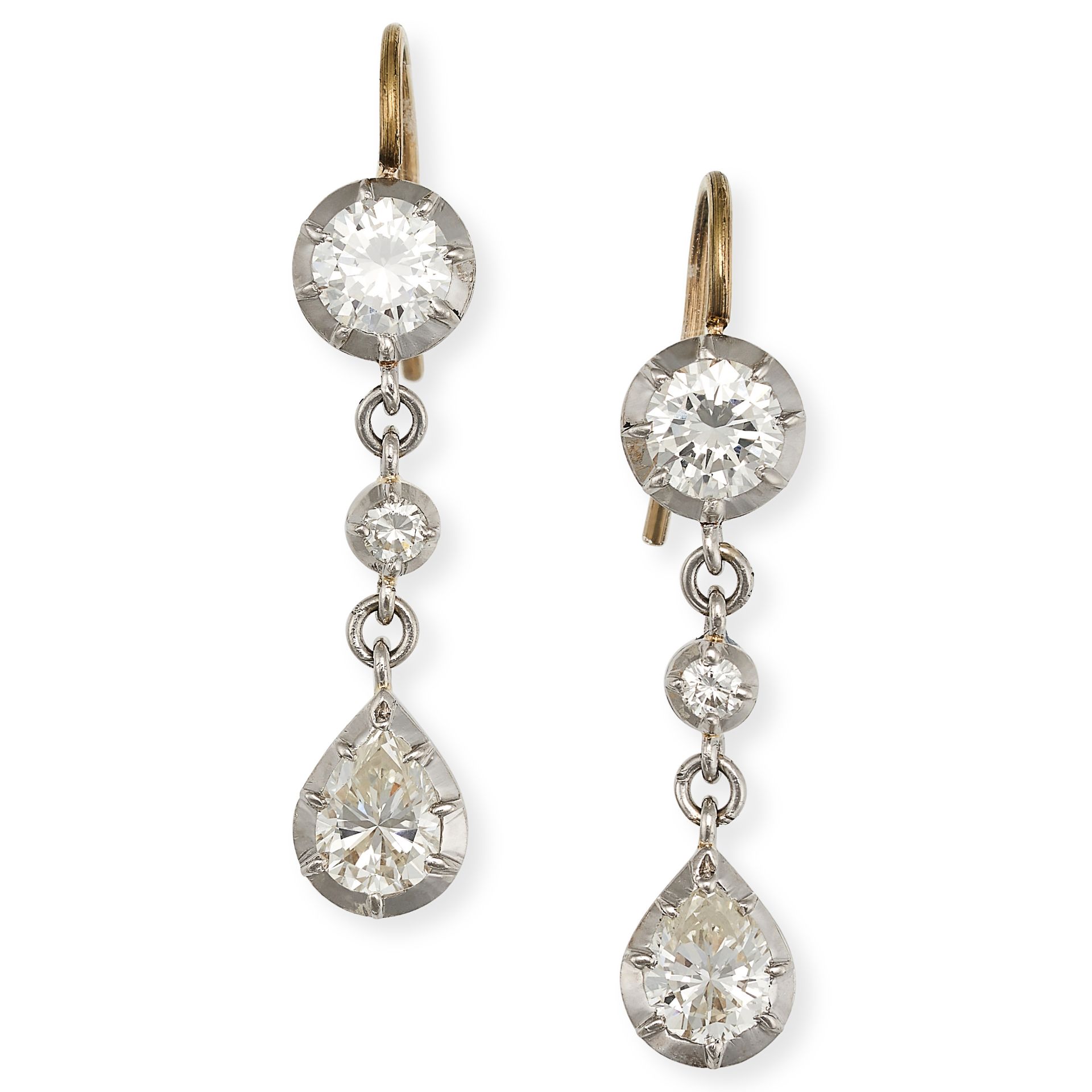 A PAIR OF DIAMOND DROP EARRINGS in yellow and white gold, each set with round brilliant cut diamo...