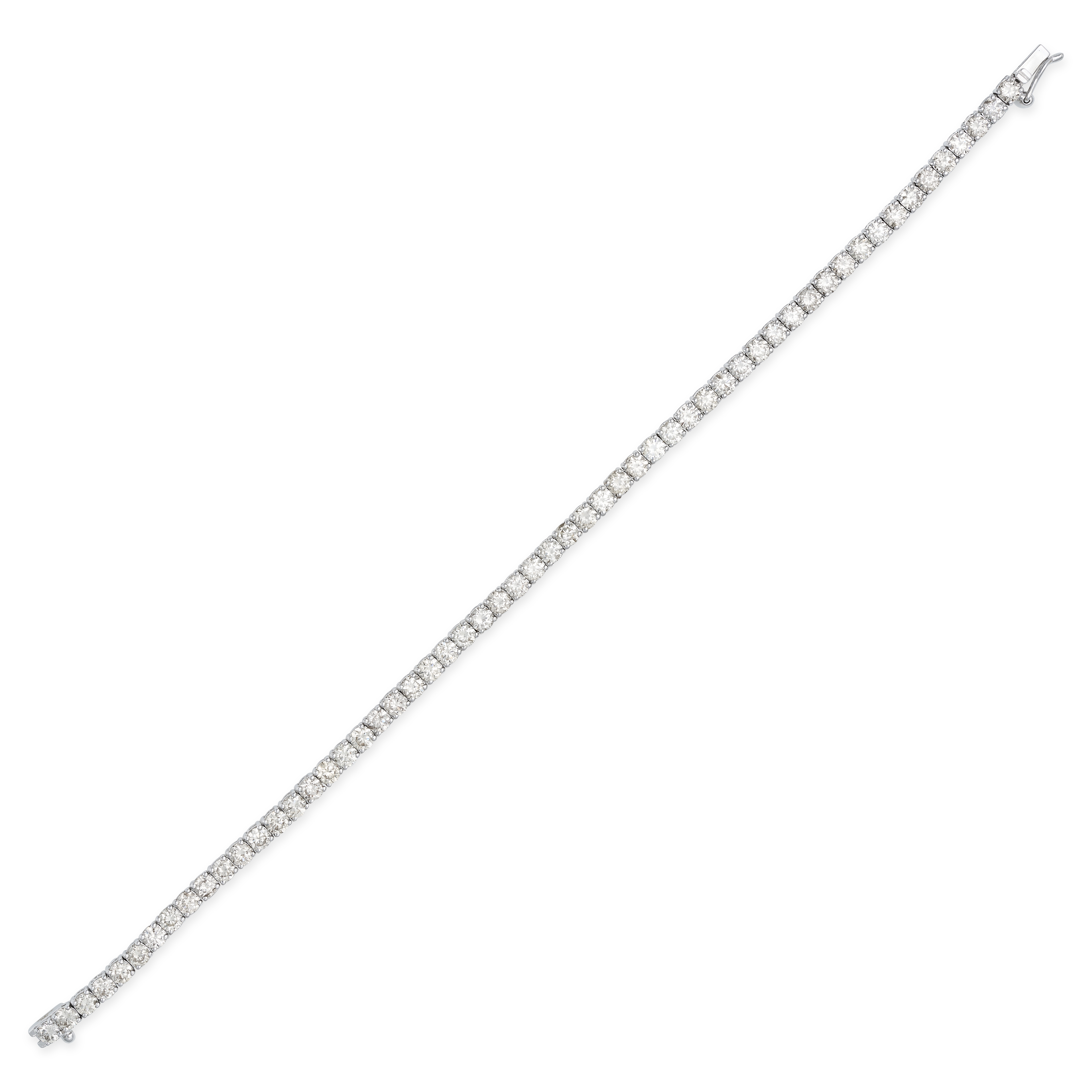 A DIAMOND LINE BRACELET in 18ct white gold, set with a row of round brilliant cut diamonds all to...