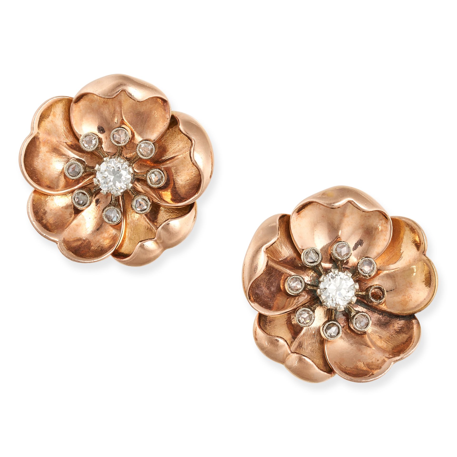 A PAIR OF DIAMOND FLOWER EARRINGS, 1940S in 14ct yellow gold, each designed as a flower set with ...