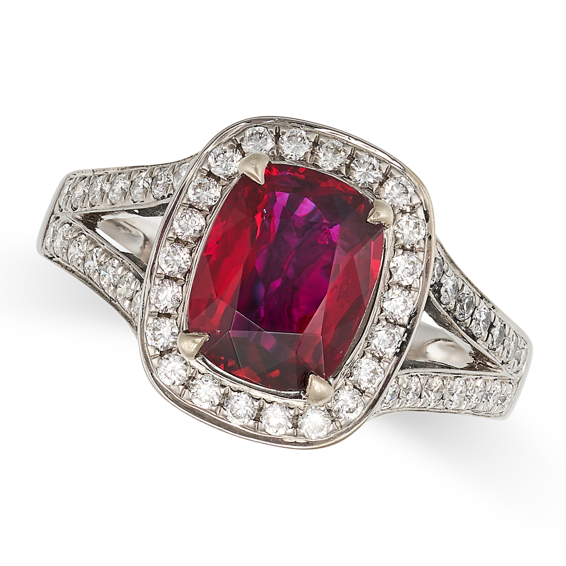 A BURMA NO HEAT RUBY AND DIAMOND RING in 18ct white gold, set with a cushion cut ruby of 2.00 car...