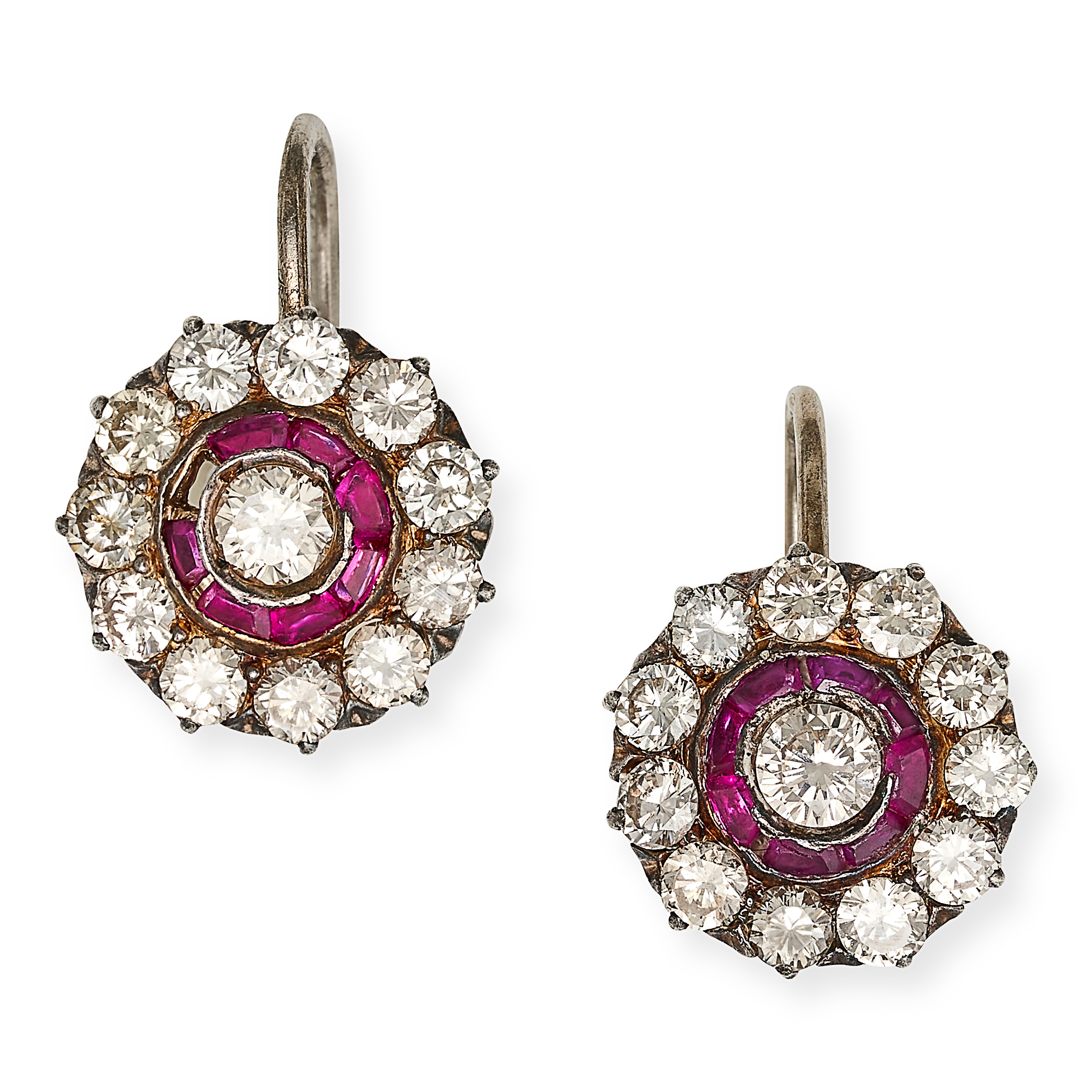 A PAIR OF FRENCH DIAMOND AND RUBY EARRINGS in 14ct yellow gold and silver, each set a round brill...