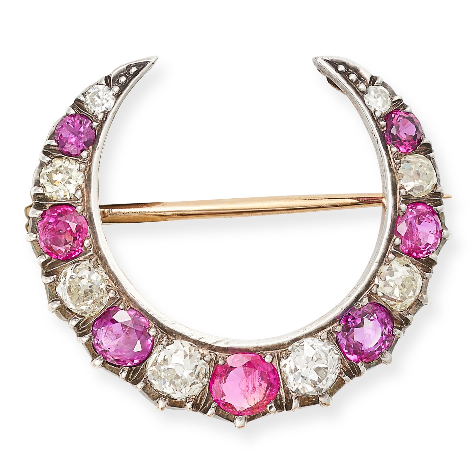 AN ANTIQUE VICTORIAN RUBY AND DIAMOND CRESCENT MOON BROOCH designed as a crescent moon, set with ...