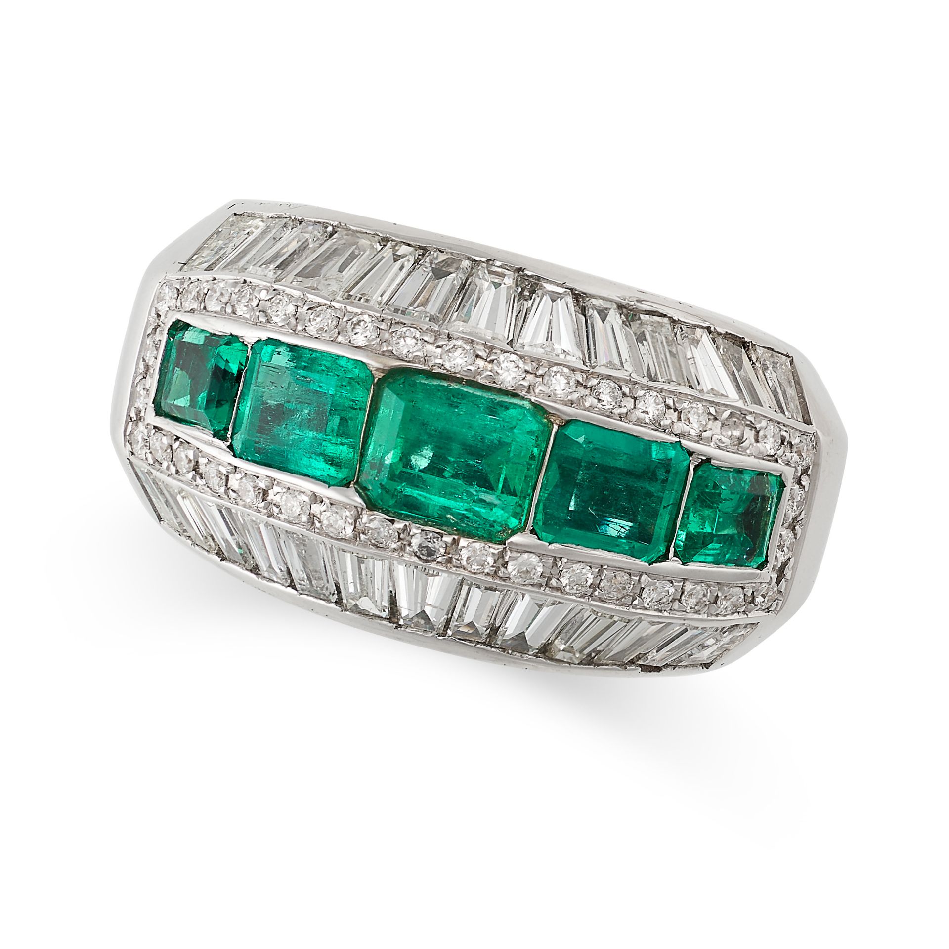 AN EMERALD AND DIAMOND BOMBE RING set with a central row of octagonal step cut emeralds, within a...