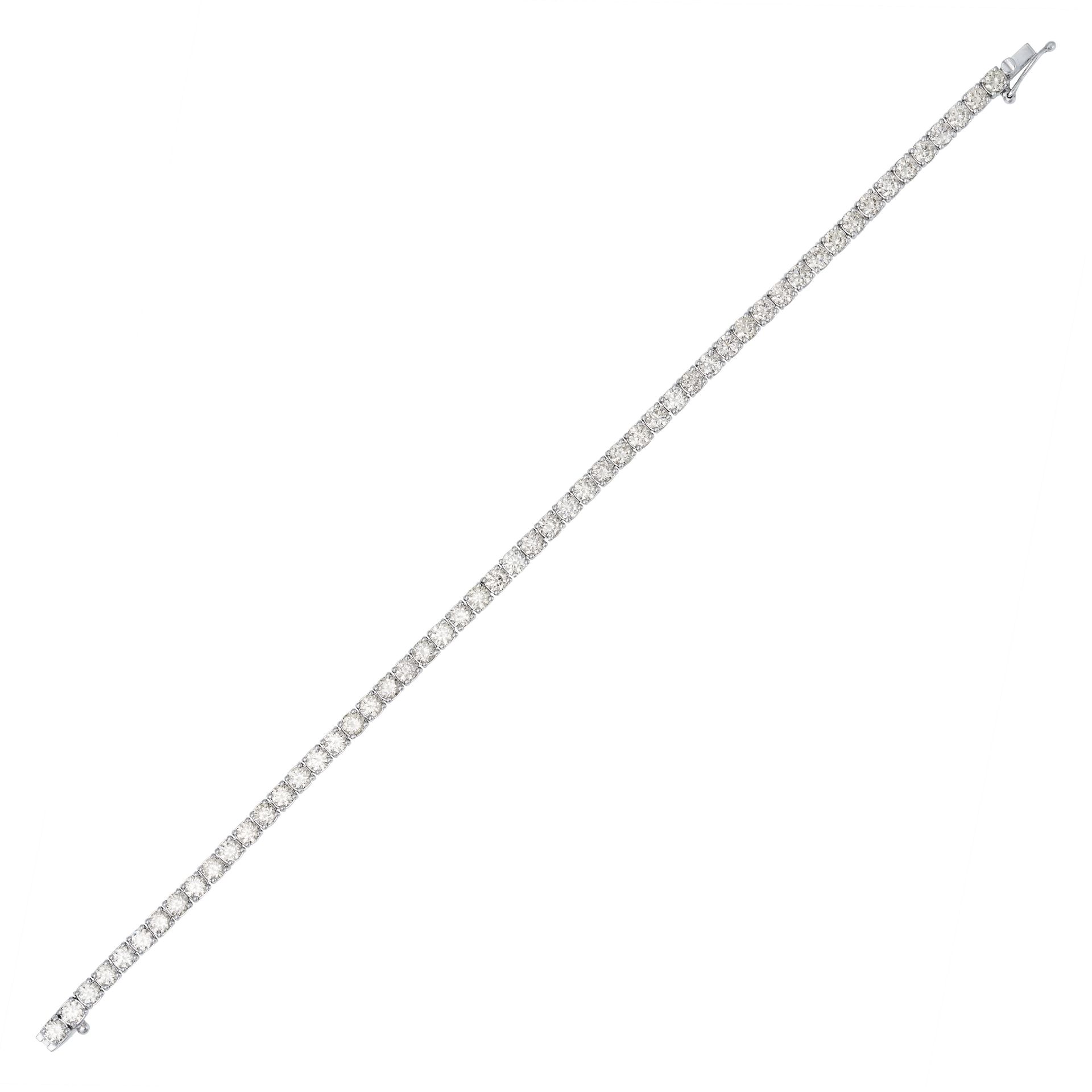 A 7.00 CARAT DIAMOND LINE BRACELET in 18ct white gold, set with a single row of round brilliant c...