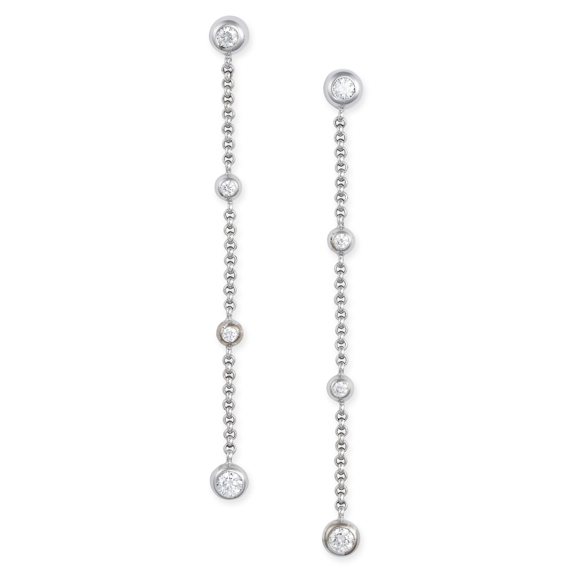 CHOPARD, A PAIR OF DIAMOND DROP EARRINGS in 18ct white gold, each set with a round brilliant cut ...