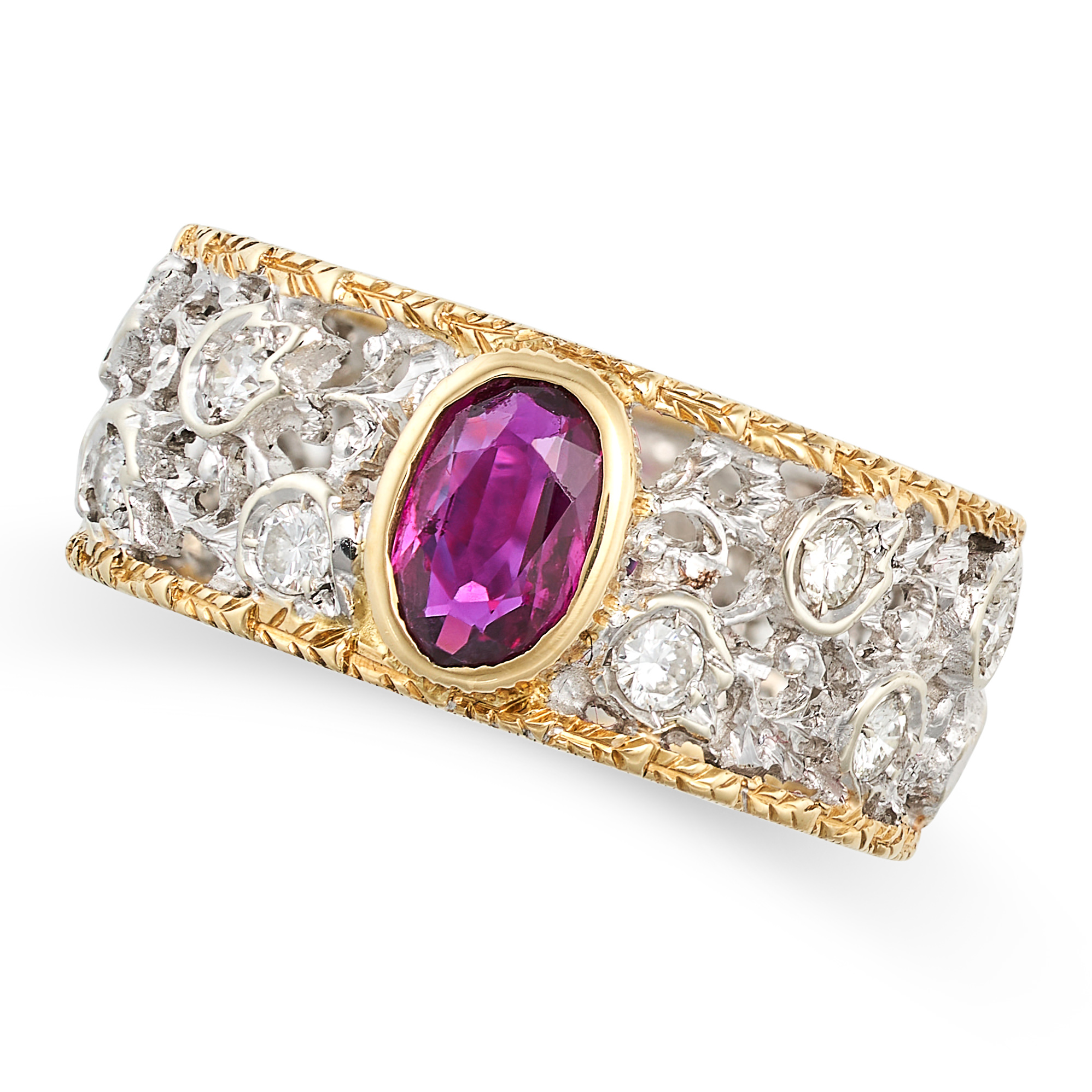 A VINTAGE RUBY AND DIAMOND DRESS RING in 18ct yellow and white gold, in the manner of Buccellati,...