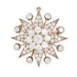 AN ANTIQUE DIAMOND STAR BROOCH / PENDANT in yellow gold and silver, designed as an eight rayed st...