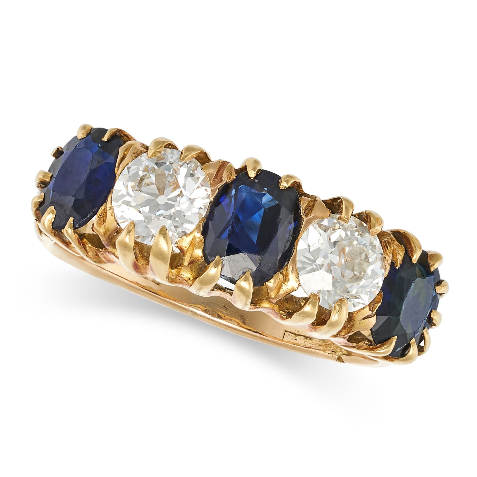 A VINTAGE DIAMOND AND SAPPHIRE FIVE STONE RING in yellow gold, set with an alternating row of ova...
