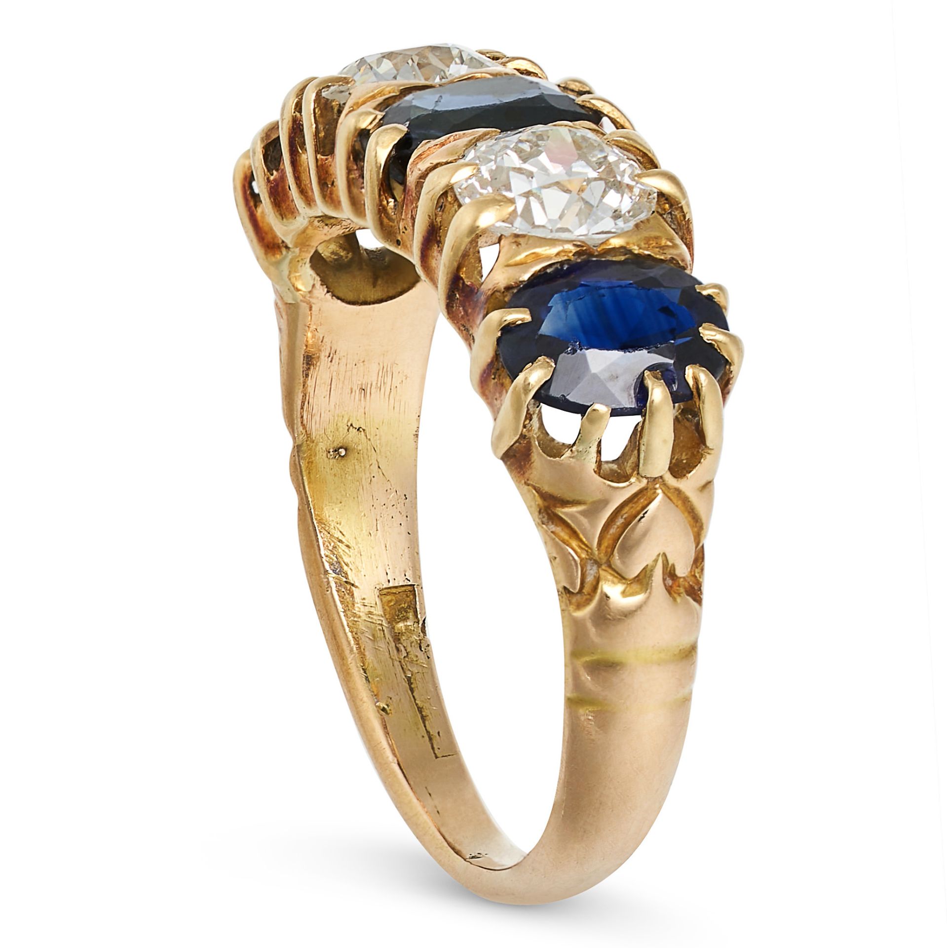 A VINTAGE DIAMOND AND SAPPHIRE FIVE STONE RING in yellow gold, set with an alternating row of ova... - Bild 2 aus 2