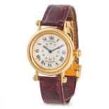 CARTIER, A VINTAGE DIABLO WRISTWATCH in 18ct yellow gold, silver guilloche dial with painted Roma...