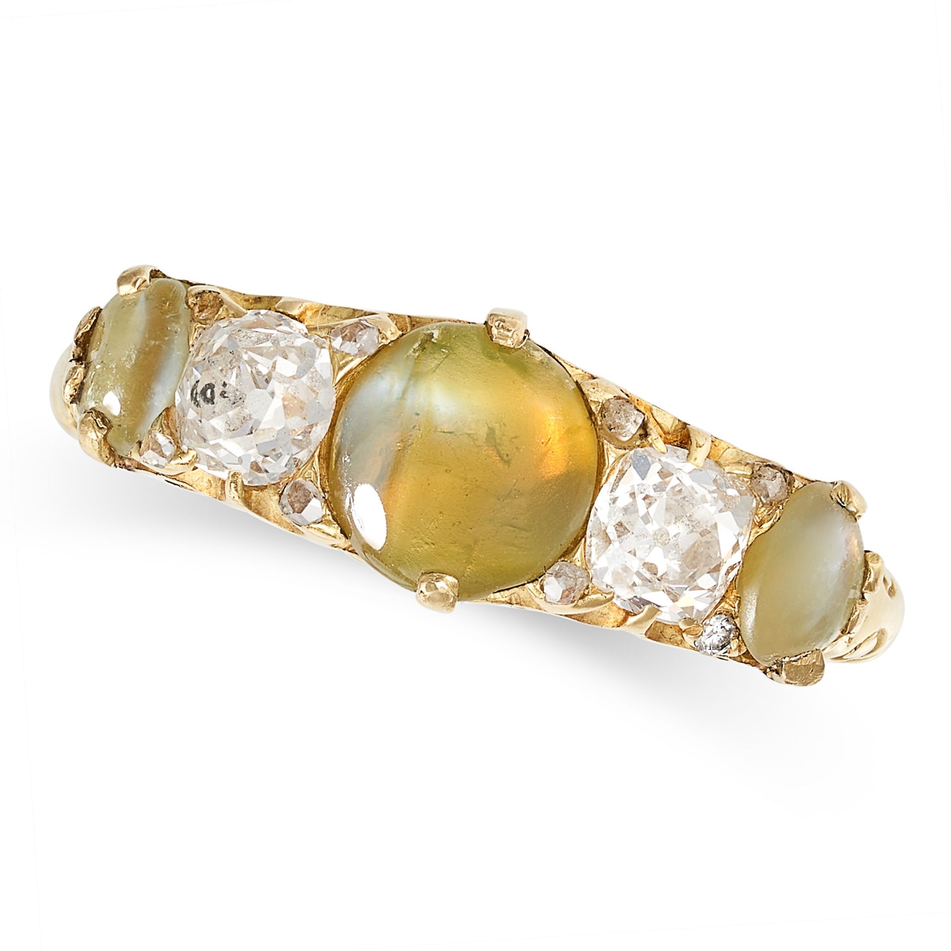A VINTAGE CAT'S EYE CHRYSOBERYL AND DIAMOND RING in 18ct yellow gold, set with alternating caboc...
