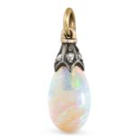 AN ANTIQUE OPAL AND DIAMOND PENDANT in yellow gold and silver, set with a polished opal drop with...