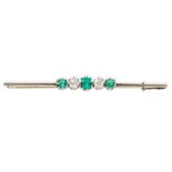 A VINTAGE EMERALD AND DIAMOND BAR BROOCH in 18ct white gold and platinum, set with alternating sq...