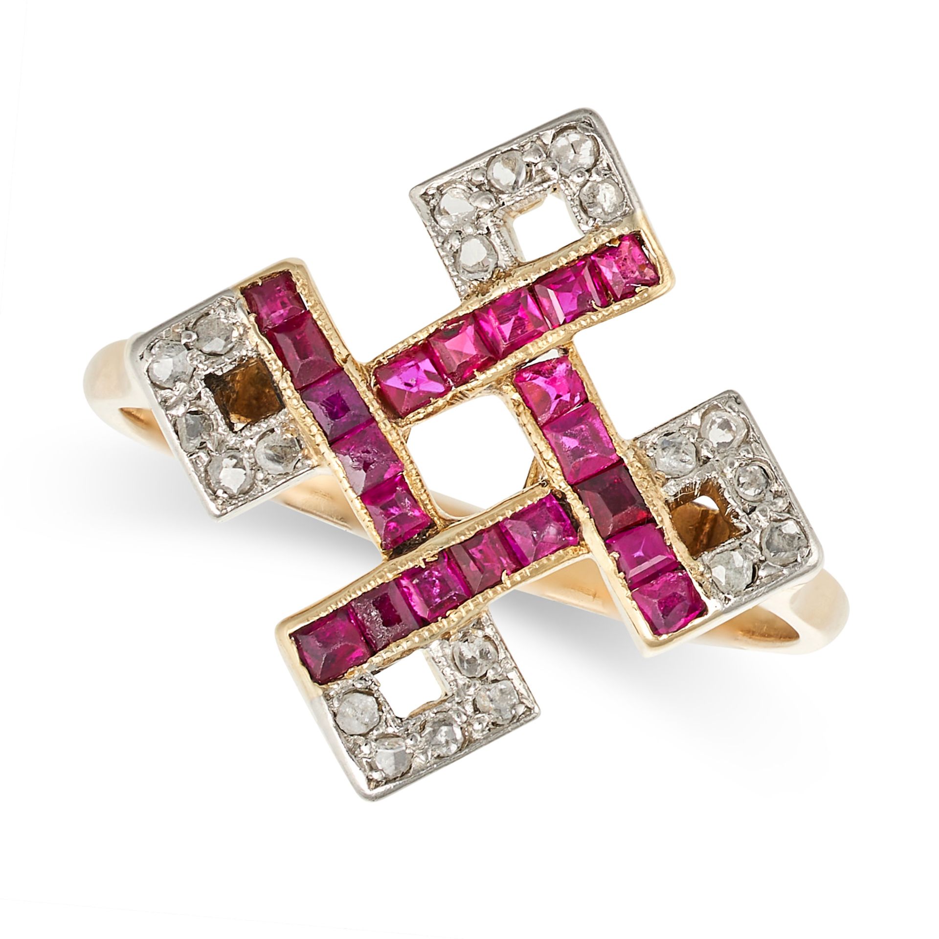 AN ART DECO RUBY AND DIAMOND DRESS RING in yellow gold and platinum, the geometric face set with ...