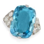 A FINE AQUAMARINE AND DIAMOND RING set with a cushion cut aquamarine of 22.43 carats, accented on...