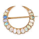 AN ANTIQUE OPAL CRESCENT MOON BROOCH in yellow gold, designed as a crescent moon set with a row o...