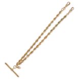 AN ANTIQUE VICTORIAN GOLD WATCH CHAIN in 9ct yellow gold, comprising a fancy link chain suspendin...