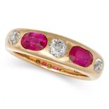 A VINTAGE RUBY AND DIAMOND GYPSY RING in 18ct yellow gold, set with a row of alternating old cut ...