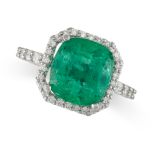 AN EMERALD AND DIAMOND RING in platinum, set with a cushion cut emerald of 6.08 carats in a borde...