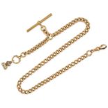 AN ANTIQUE ALBERT CHAIN AND FOB SEAL PENDANT in 18ct yellow gold, the curb chain suspending a fob...