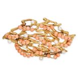 JOHN DONALD, A VINTAGE CORAL AND PEARL BROOCH, 1970 in 18ct yellow gold, in abstract design, the ...
