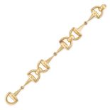 PETOCHI, A GOLD BRACELET in 18ct yellow gold, with horse bit links, signed G Petochi, stamped 750...